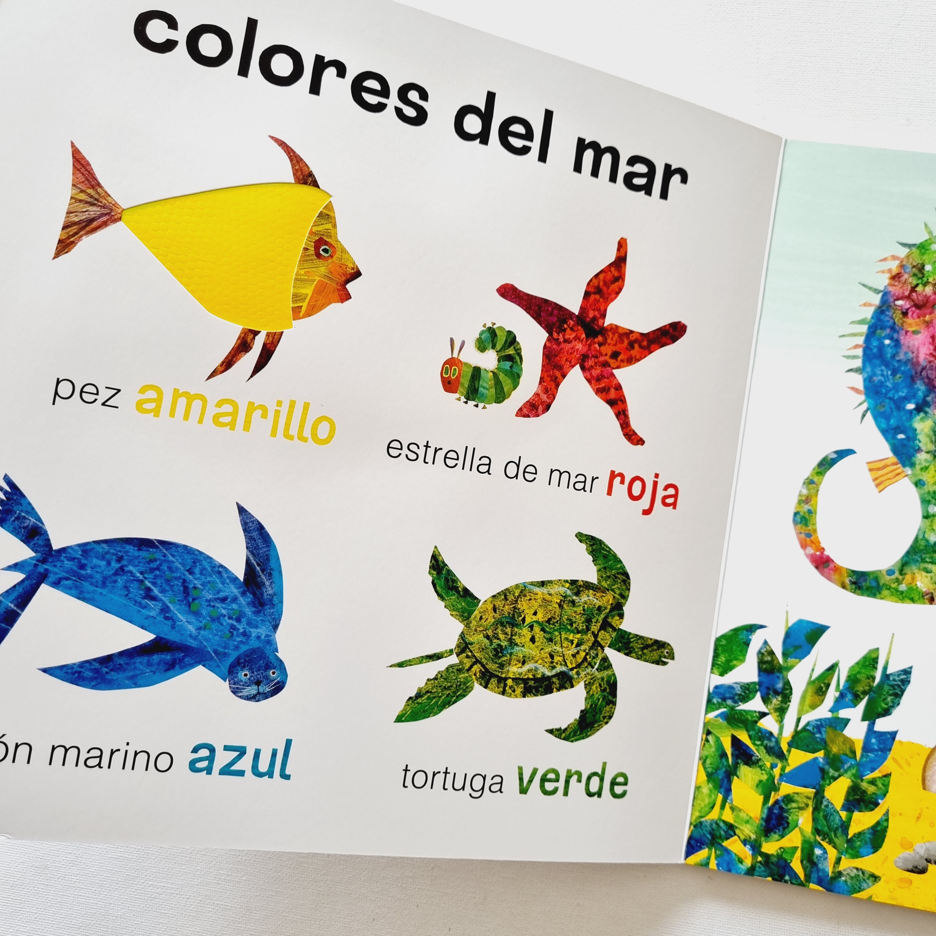 La pequeña oruga glotona. Toca y descubre los animales